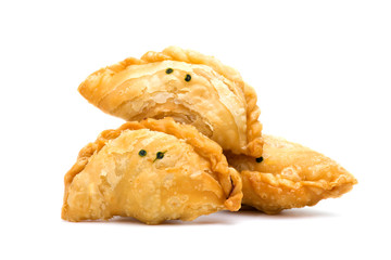 curry puffs are a savory and sweet Asia dessert on a white background.