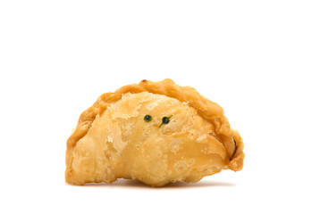 curry puffs are a savory and sweet Asia dessert on a white background.