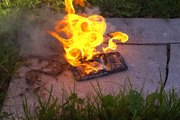 Burning smartphone, burning mobile phone