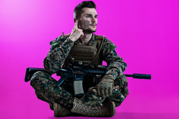 soldier preparing gear for action and checking communication