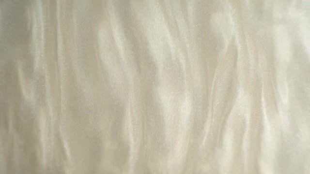 Rheoscopic fluid. Beautiful movement of particles in a liquid. Fantastic patterns and shapes. 50 fps