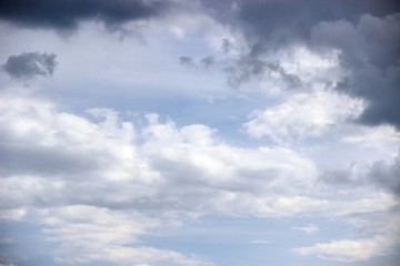 After the rain. blue sky covered with gray clouds. cloudy sky background