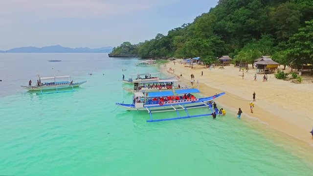 Aerial View of Tropical Beach Holiday, Seven Commandos Beach, El-Nido, Palawan Island, Philippines A