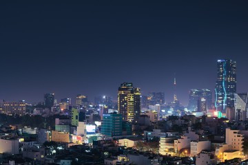 Obraz premium Vibrant night shot of Saigon, Vietnam (Ho Chi Minh City). Long exposure elevated view.
