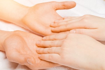 Caregiver, carer hand holding hand man