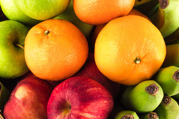 Fresh mixed fruits ( orange and red apple and banana and green apple. Fruits Healthy eating food background 