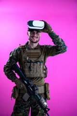 Fototapeta premium soldier in battle using virtual reality glasses
