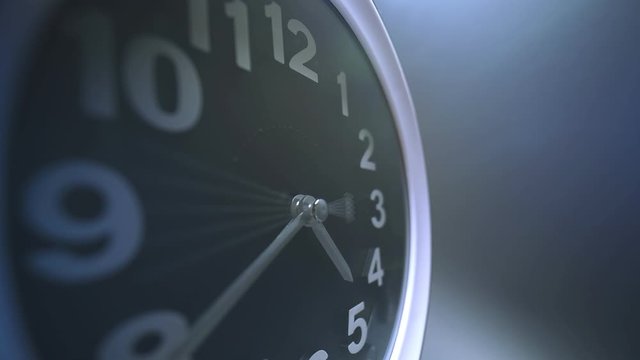 Simple table clock dial close-up time running timelapse. Moving fast. Extreme macro with wide 9mm lens, long exposure view of the time lapse counting down. 4k business concept