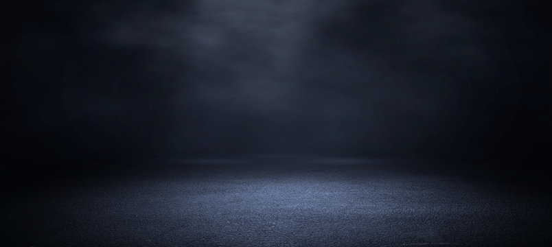 Dark room with light and smoke background.