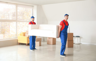 Loaders carrying furniture on moving day