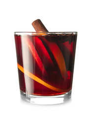 Glass of tasty mulled wine on white background