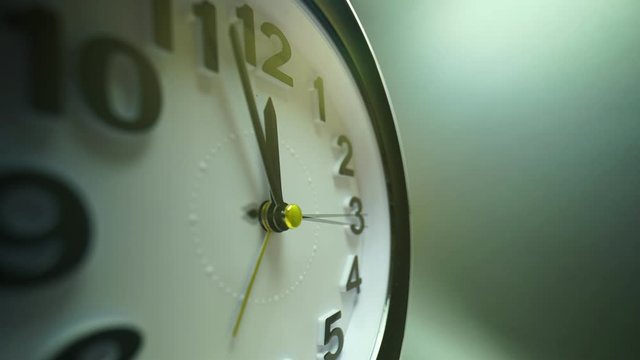 Simple clock dial close-up. Business timer. Extreme macro with wide 9mm lens view of the time lapse  counting down 25 minutes to twelve. 4k time concept.