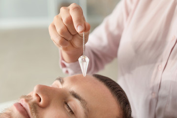 Reiki master working with patient