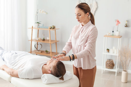 Reiki Master Working With Patient