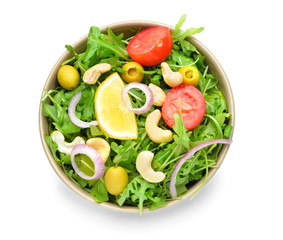 Plate with tasty salad on white background
