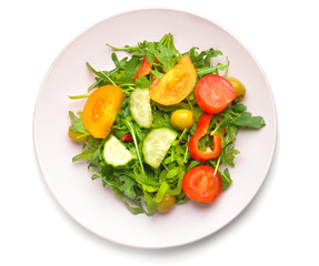 Plate with tasty salad on white background