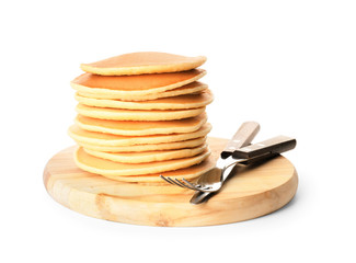 Board with stack of tasty pancakes on white background
