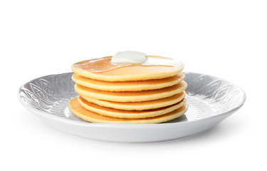 Plate with stack of tasty pancakes on white background