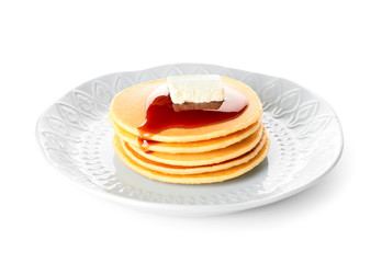 Plate with stack of tasty pancakes on white background