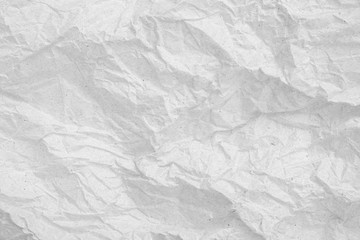 Gray crumpled paper empty background.texture of gray creased paper
