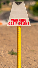 Vertical Selective focus of a Warning Gas Pipeline sign for security and safety