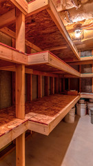 Vertical frame Interior of food cold storage with wooden racks and insulated wall and ceiling