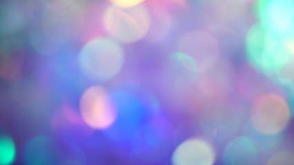 Blurred holographic neon pink and purple lights. Holiday abstract background