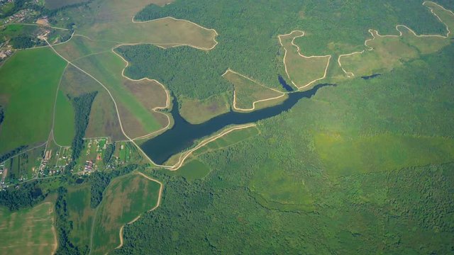 Aerial Survey Of The Lake, Green Fields, Forests. Green Earth