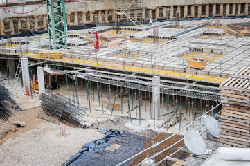 construction work in progress with building material foundation