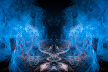 Pattern, Neon pink, blue  and  purple smoke in the  on a dark isolated background. Background from the smoke of vape.