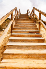 Wooden stairway on beach