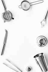 Bar utensil, tools - shaker, stainer - on white background top-down frame copy space