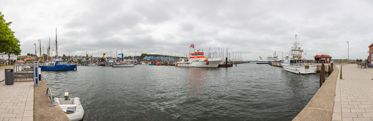 Fototapeta premium Panoramic picture of the harbor of the German village Laboe at the Baltic sea in summer