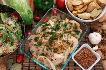 Fried piece of turkey meat with onions