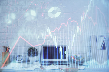 Forex market chart hologram and personal computer background. Multi exposure. Concept of investment.