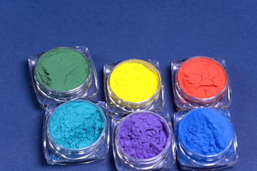 Multicolored powder paints. Paints in the form