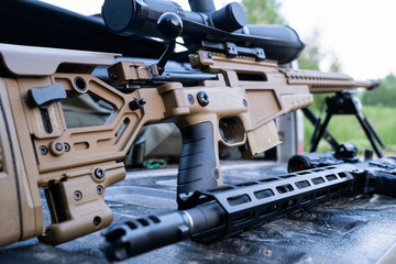 Close up of modern military sniper rifle 