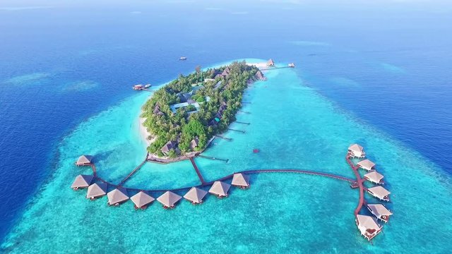 Aerial View of Luxurious Overwater Villas Resort in Maldives Islands B