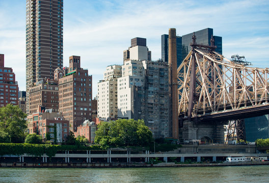 Queensboro Bridge in Midtown Manhattan with New York City skyline over East River
