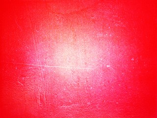 grunge red background with light centre and darker corners