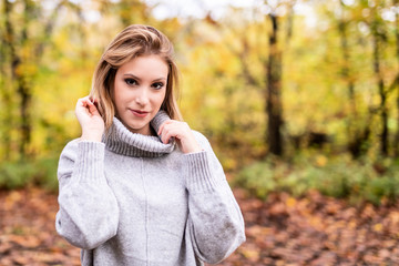 Fashion Portrait in Autumn Woods