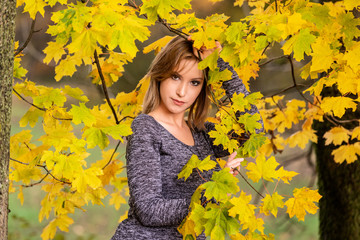 Fashion Portrait in Autumn Woods
