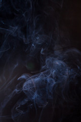 Smoke on a black background.