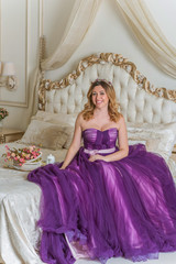 Romantic woman in violet evening dress, fashionable concept 