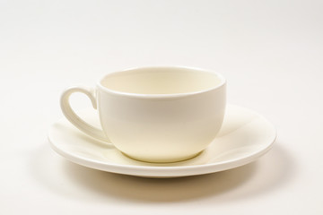 White cup isolated on white background.