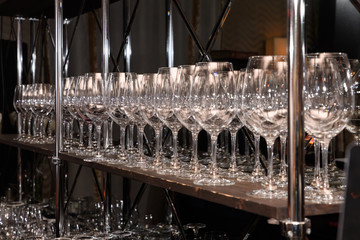 Bar shelf in clean empty glasses