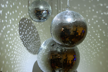 Shiny disco ball on nightclub