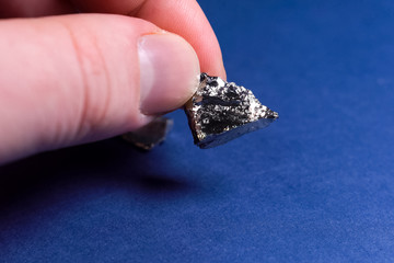 Pieces of germanium metal. Rare earth
