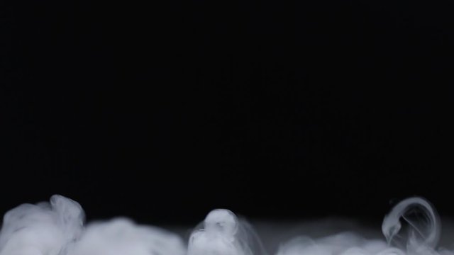dry ice evaporation on a black background