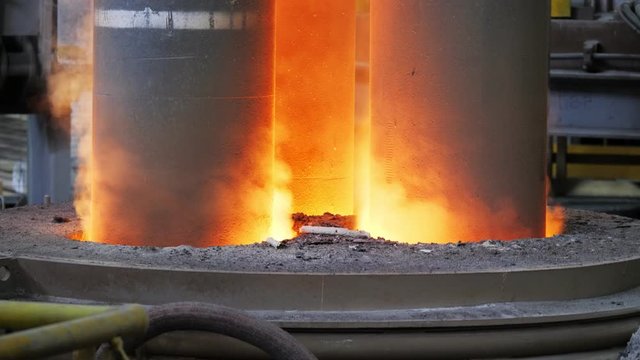 Fire and melted steel from a electric arc furnace.